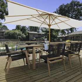 a table and chairs on a deck